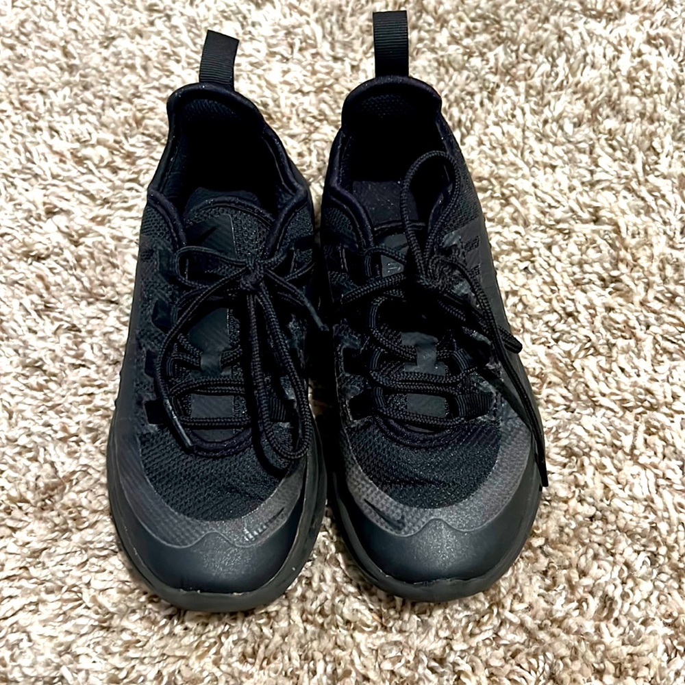 Black toddler Nike sneaker gentle worn